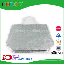 La bolsa de asas clara agradable reciclable de plata de las compras del PVC